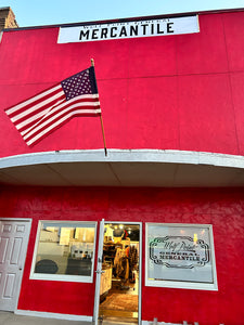 Wolf Point General Mercantile logo