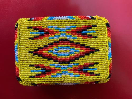Beaded belt buckle